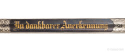 A rare Luftwaffe presentation sword awarded by Hermann Göring, manufactured by Carl Eickhorn of Solingen. Features a gold-inlaid inscription and a blued panel blade