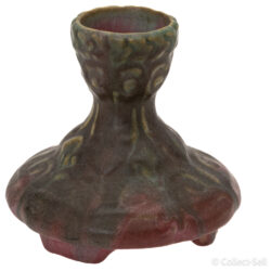 Side view of a vintage art pottery vase with an elegant art nouveau design and earthy pink and green glaze tones