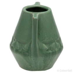 Side view of a vintage Arts and Crafts green pottery vase with dual handles and textured midsection, marked 'NG' on the bottom.