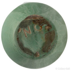 bottom view of a vintage Arts and Crafts green pottery vase with dual handles and textured midsection, marked 'NG' on the bottom.