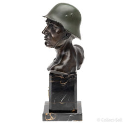 Antique Art Deco marble desk set with bronze busts of Adolf Hitler and a Wehrmacht soldier by Wilhelm Zoll, featuring black and gold-veined marble, a heroic soldier bust with field-green patina, and gold political eagle accents