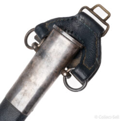 Close-up of the scabbard of a Luftwaffe officer’s sword, featuring a blue leather covering, metal fittings, and dual suspension rings with a leather hanger