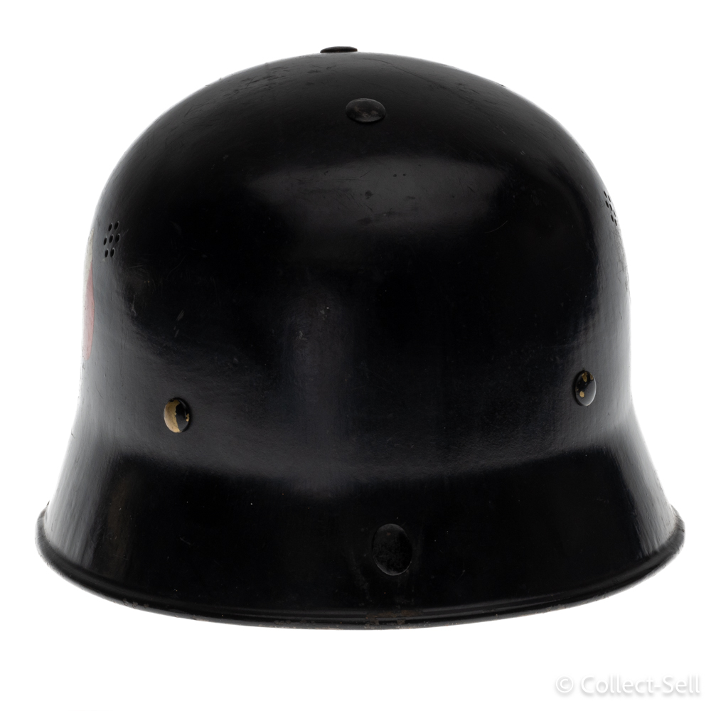 Rear view of a Civic M34 German helmet with rivets and smooth black finish