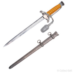 WWII German Army Officer’s Dagger featuring an orange celluloid grip, detailed Wehrmacht eagle crossguard, original silver portapee, polished blade, and pebbled metal scabbard with suspension rings