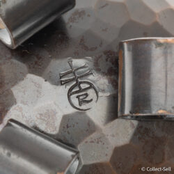 Roycroft hallmark on hammered copper base