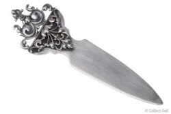 Angled view of Tiffany sterling silver letter opener showing ornate handle and blade