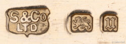 S&Co Ltd maker’s mark with lion passant, leopard head, and 1935 London date letter