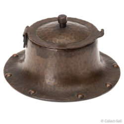 Side view of closed Roycroft inkwell with knob finial and riveted flared base