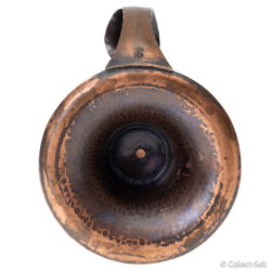 Underside view showing deep bowl shape and surface oxidation