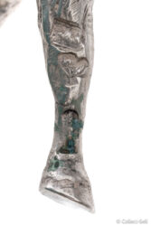 Sterling silver donkey figurine leg detail with surface texture and hallmark placement