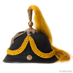 Left side of M1881 M.C. Lilley Cavalry officer helmet showing cord, side button, and chinstrap.