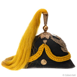 Right side of Model 1881 Cavalry officer helmet showing cord drape and plume base.